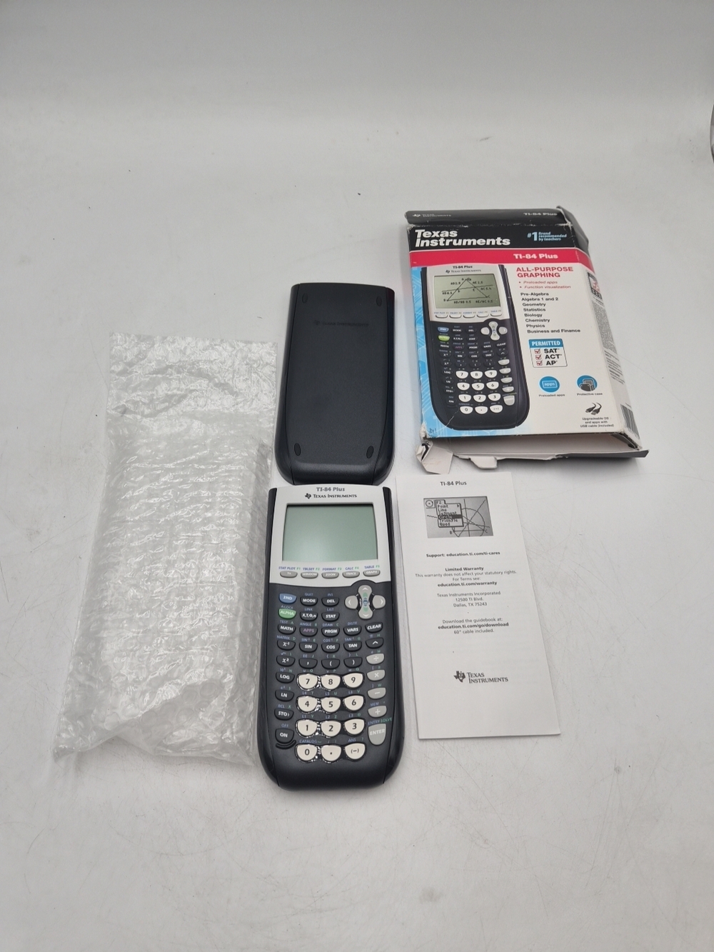 Texas Instruments TI-84 Plus Graphing Calculator in Black and White